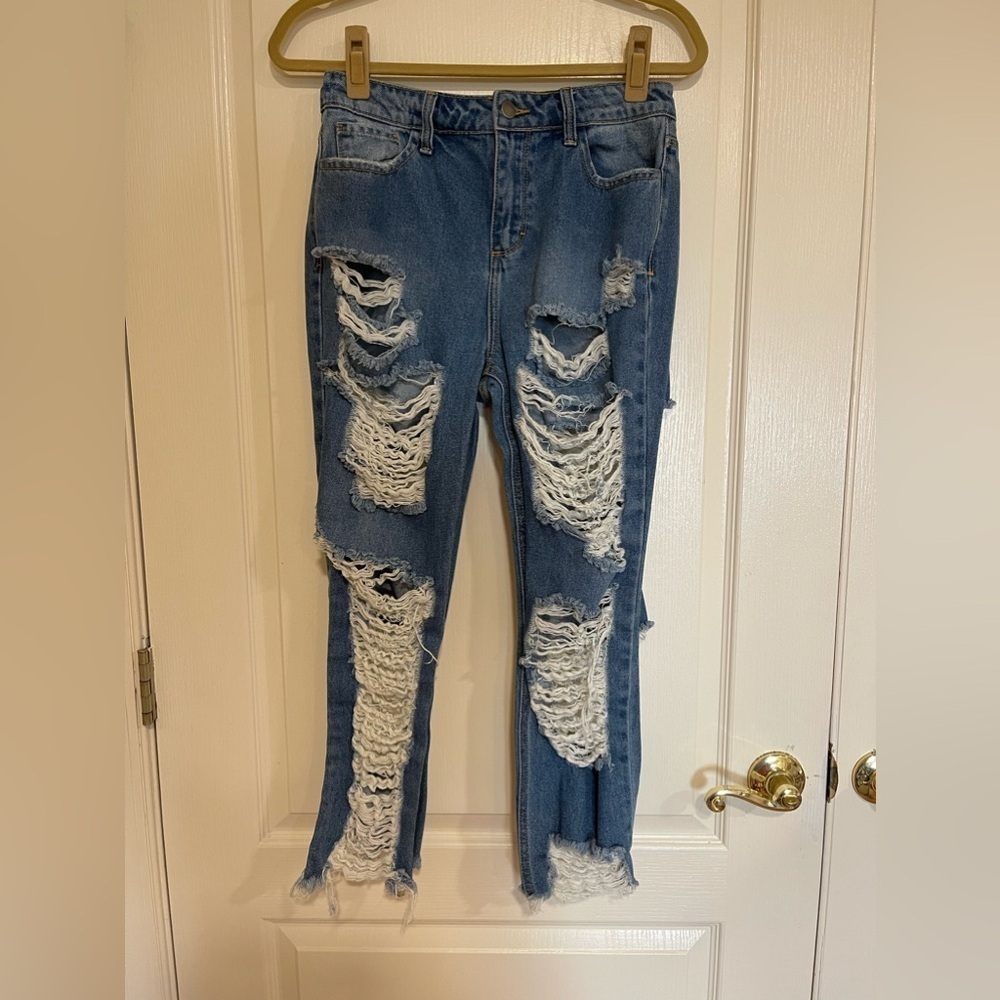 Fashion Nova blue ripped distressed jeans​​​​​​​